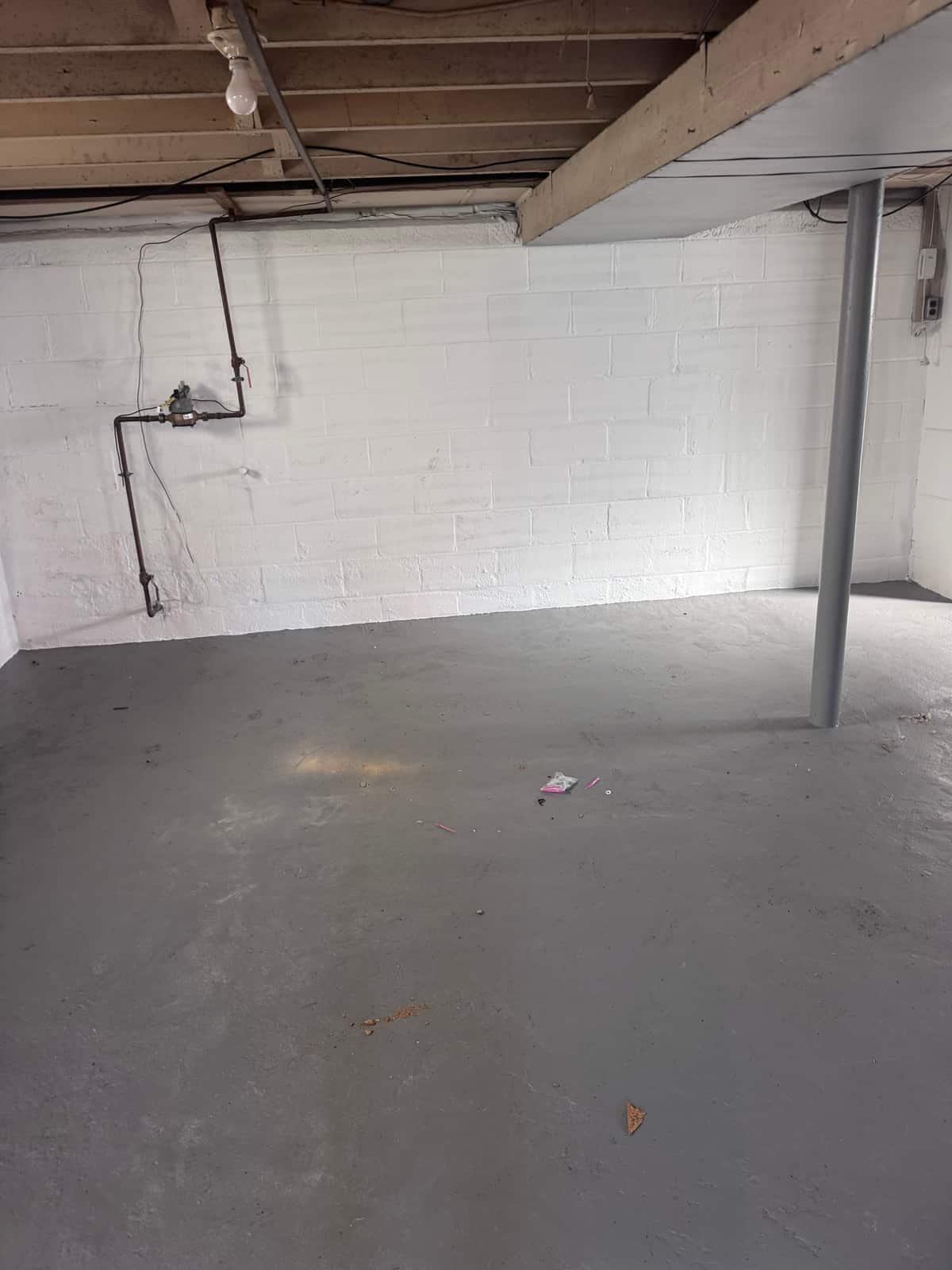 The same Wilmington basement cleared down to the painted floor